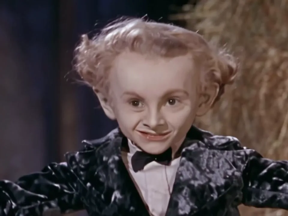 Rumpelstiltskin AI role 1: the tiptoe dancer shushing the camera in the original clip